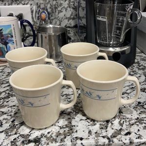 Set of four (4) ivory Corning mugs